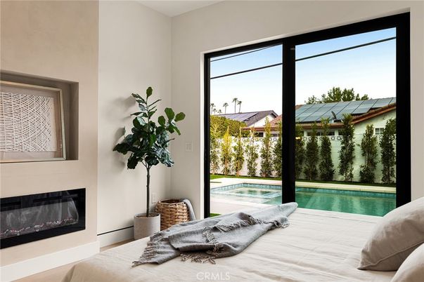 Bedroom, Fireplace, Interior, Pool, Wood Texture Flooring
