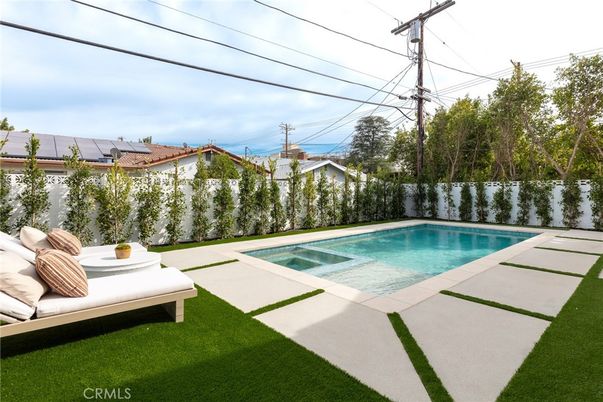 Exterior, Pool, Solar Panels