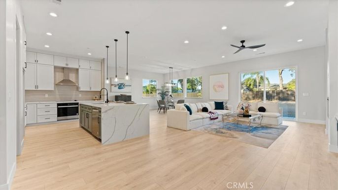 Dining room, Interior, Kitchen, Living room, Pendant Lights, Recessed Lighting, Stainless Steel Appliances, Wood Texture Flooring
