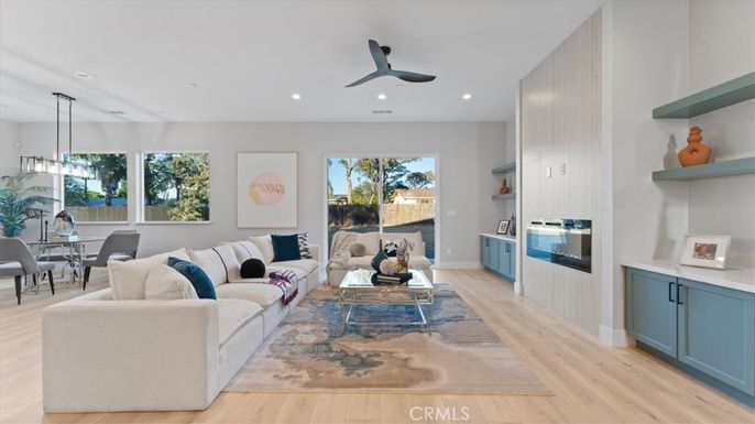 Dining room, Fireplace, Interior, Living room, Pendant Lights, Recessed Lighting, Wood Texture Flooring