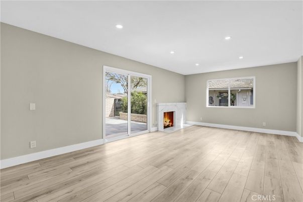 Empty room, Fireplace, Interior, Recessed Lighting, Wood Texture Flooring