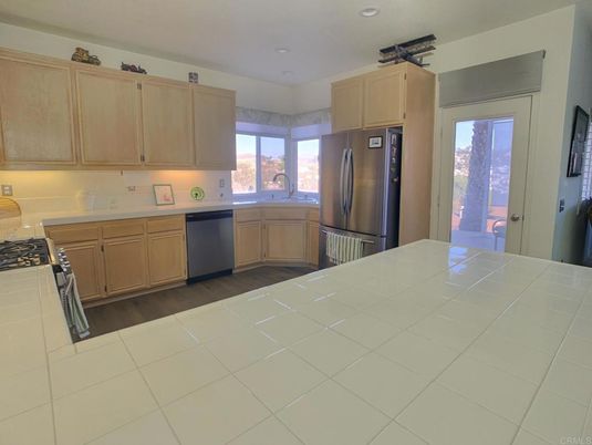 Interior, Kitchen, Recessed Lighting, Stainless Steel Appliances, Tile Countertops