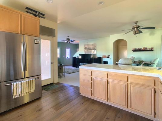 Interior, Kitchen, Recessed Lighting, Stainless Steel Appliances, Tile Countertops, Wood Texture Flooring