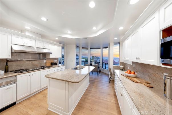 Dining room, Interior, Kitchen, Recessed Lighting, Stainless Steel Appliances, Wood Texture Flooring