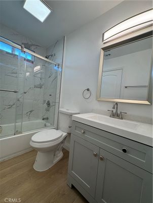 Bathroom, Glass Shower, Interior, Marble Walls, Wood Texture Flooring