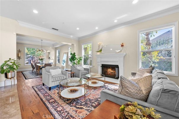 Chandelier, Dining room, Fireplace, Interior, Living room, Recessed Lighting, Wood Texture Flooring