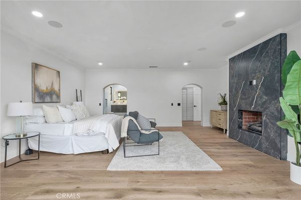 Bedroom, Fireplace, Interior, Living room, Recessed Lighting, Wood Texture Flooring