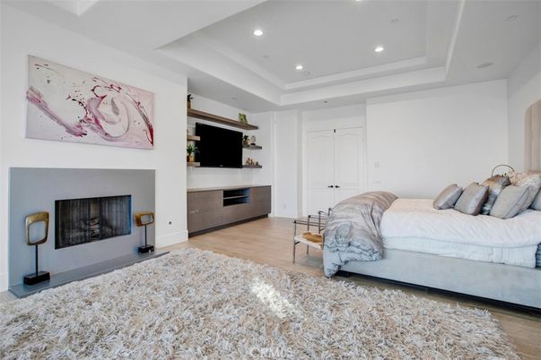 Bedroom, Fireplace, Interior, Recessed Lighting, Wood Texture Flooring