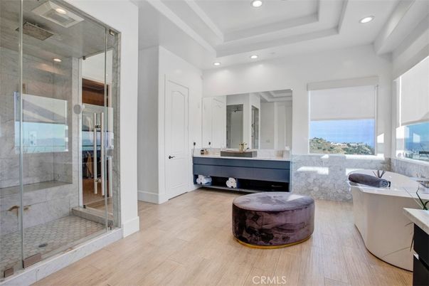 Bathroom, Free Standing Baths, Glass Shower, Interior, Recessed Lighting, Wood Texture Flooring