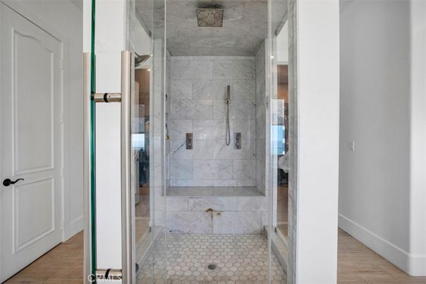 Bathroom, Glass Shower, Interior, Marble Walls, Wood Texture Flooring