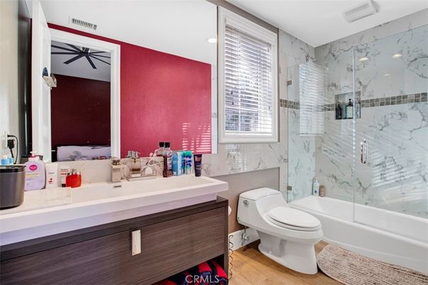 Bathroom, Glass Shower, Interior, Marble Walls, Recessed Lighting, Wood Texture Flooring