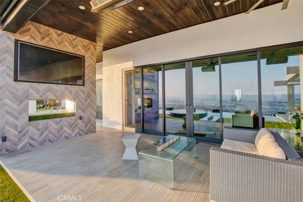 Fireplace, Interior, Living room, Recessed Lighting, Water, Wooden Ceilings, Wood Texture Flooring