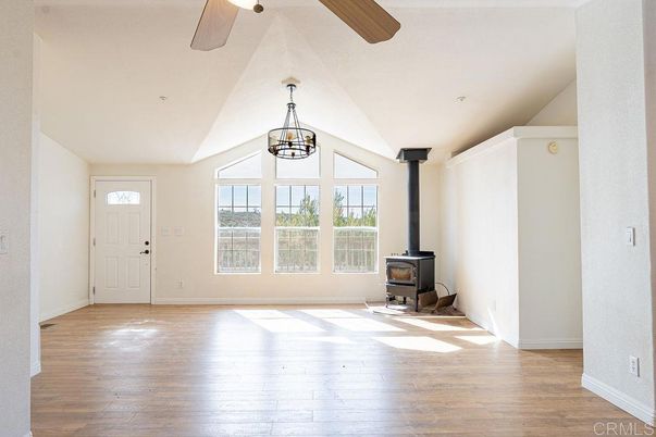 Empty room, Fireplace, Interior, Pendant Lights, Wood Texture Flooring