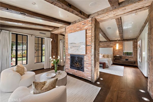 Bedroom, Fireplace, Interior, Recessed Lighting, Stone Walls, Wooden Beams, Wood Texture Flooring