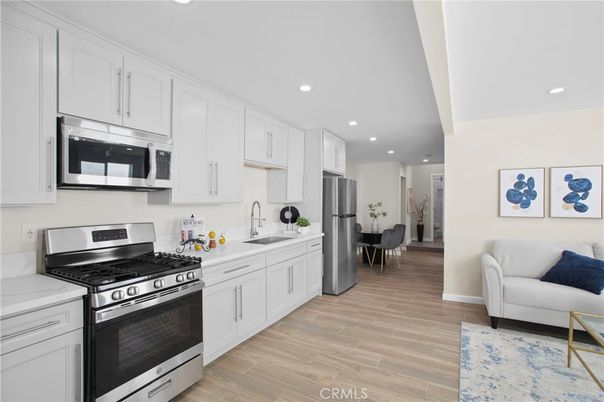 Interior, Kitchen, Recessed Lighting, Stainless Steel Appliances, Wood Texture Flooring