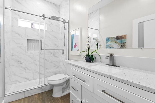Bathroom, Glass Shower, Interior, Marble Walls, Wood Texture Flooring