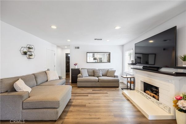 Fireplace, Interior, Living room, Recessed Lighting, Wood Texture Flooring