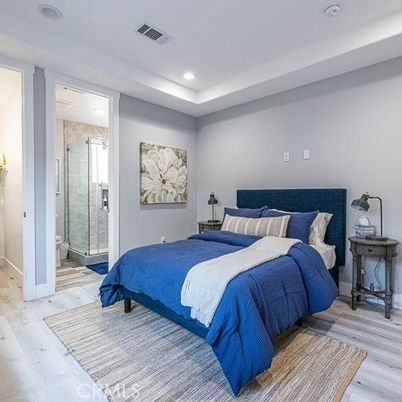 Bathroom, Bedroom, Glass Shower, Interior, Recessed Lighting, Wood Texture Flooring