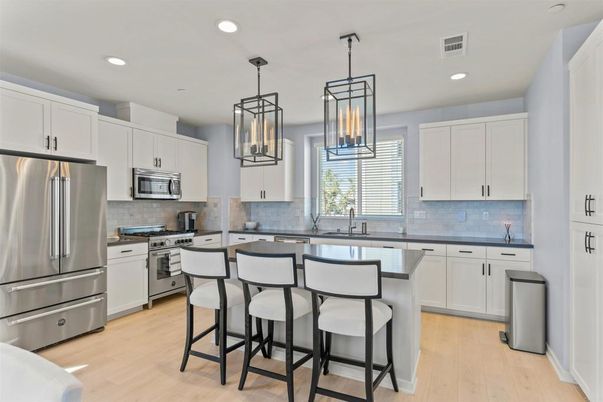 Interior, Kitchen, Pendant Lights, Recessed Lighting, Stainless Steel Appliances, Wood Texture Flooring