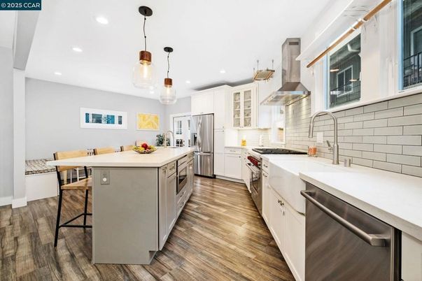 Interior, Kitchen, Pendant Lights, Recessed Lighting, Stainless Steel Appliances, Wood Texture Flooring
