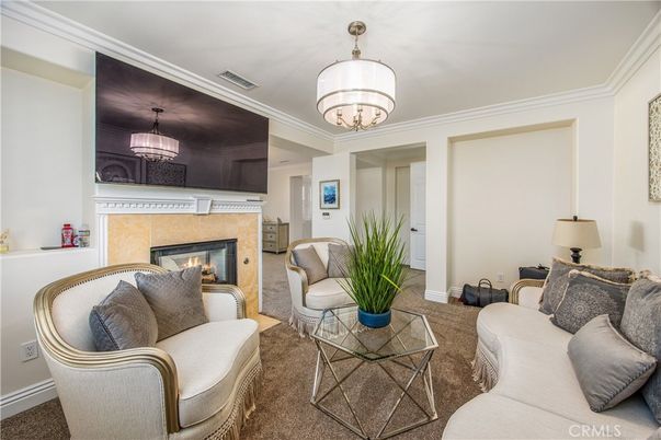 Chandelier, Fireplace, Interior, Living room