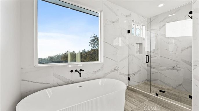 Bathroom, Free Standing Baths, Glass Shower, Interior, Marble Walls, Recessed Lighting