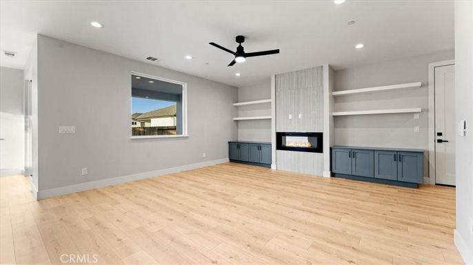 Empty room, Fireplace, Interior, Recessed Lighting, Wood Texture Flooring