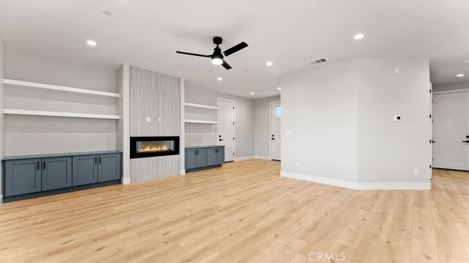 Empty room, Fireplace, Interior, Recessed Lighting, Wood Texture Flooring
