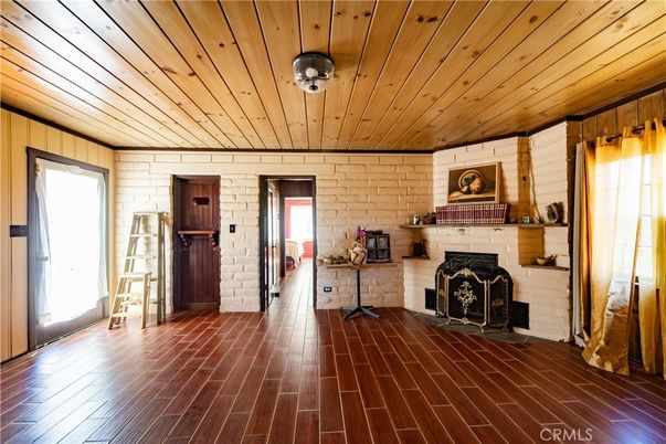 Empty room, Fireplace, Interior, Stone Walls, Wooden Ceilings, Wood Texture Flooring, Wooden Walls