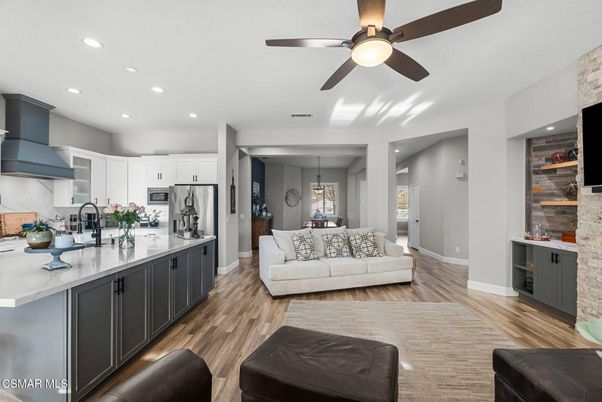 Dining room, Interior, Kitchen, Living room, Pendant Lights, Recessed Lighting, Stainless Steel Appliances, Wood Texture Flooring