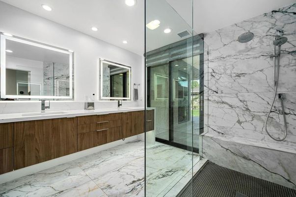 Bathroom, Dual Sink Vanities, Glass Shower, Interior, Marble, Marble Walls, Recessed Lighting