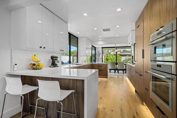 Dining room, Interior, Kitchen, Pendant Lights, Recessed Lighting, Stainless Steel Appliances, Wood Texture Flooring