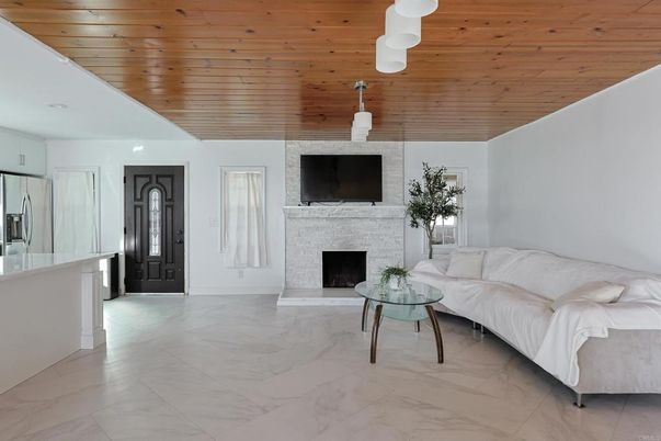 Fireplace, Interior, Living room, Marble, Pendant Lights, Wooden Ceilings