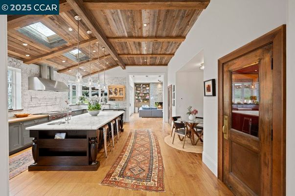 Dining room, Interior, Kitchen, Pendant Lights, Recessed Lighting, Stainless Steel Appliances, Stone Walls, Wooden Beams, Wooden Ceilings, Wood Texture Flooring