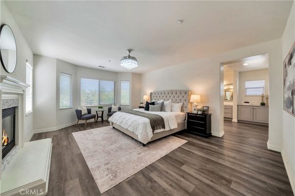 Bedroom, Fireplace, Interior, Recessed Lighting, Wood Texture Flooring