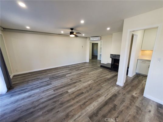 Empty room, Fireplace, Interior, Recessed Lighting, Wood Texture Flooring