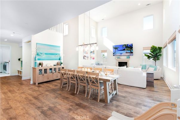 Dining room, Fireplace, Interior, Living room, Pendant Lights, Recessed Lighting, Wood Texture Flooring