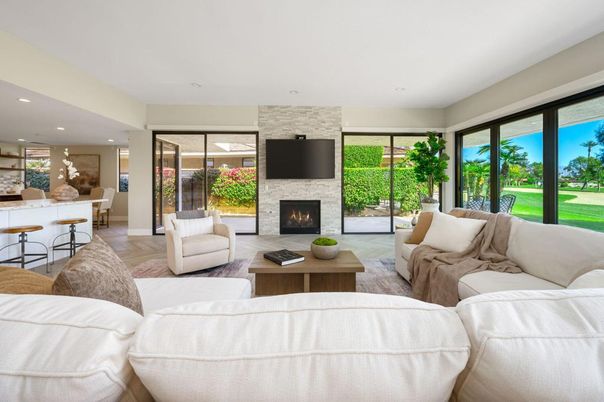 Dining room, Fireplace, Interior, Living room, Recessed Lighting, Stone Walls, Wood Texture Flooring