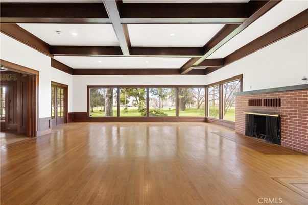 Empty room, Fireplace, Interior, Recessed Lighting, Stone Walls, Wooden Beams, Wood Texture Flooring