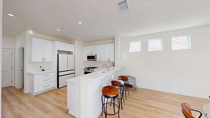 Interior, Kitchen, Recessed Lighting, Stainless Steel Appliances, Wood Texture Flooring