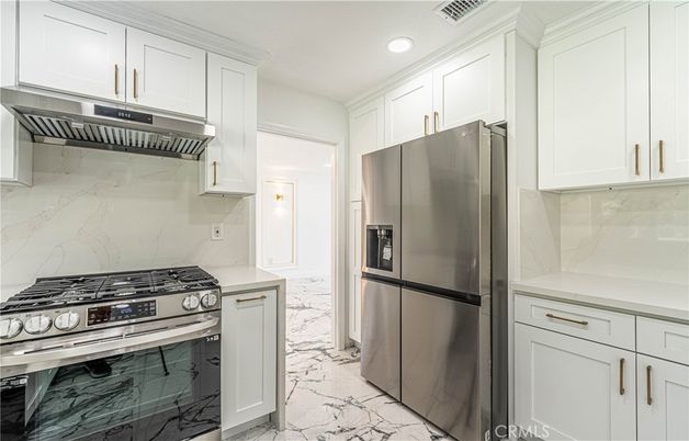 Interior, Kitchen, Marble, Marble Walls, Recessed Lighting, Stainless Steel Appliances
