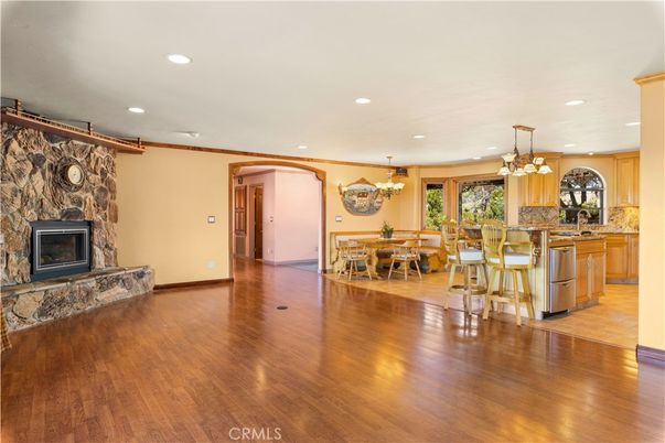 Chandelier, Dining room, Fireplace, Interior, Kitchen, Pendant Lights, Recessed Lighting, Wood Texture Flooring