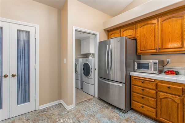 Interior, Kitchen, Tile Countertops, Washer