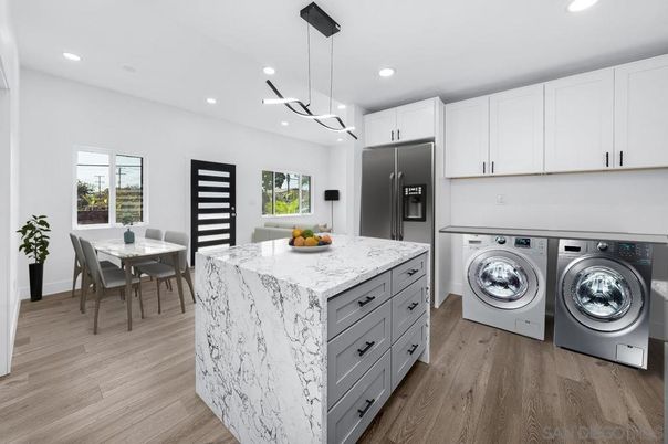Dining room, Interior, Kitchen, Pendant Lights, Recessed Lighting, Washer, Wood Texture Flooring