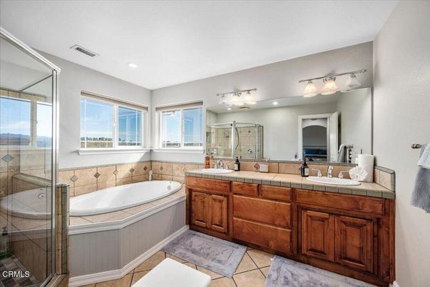 Bathroom, Dual Sink Vanities, Glass Shower, Interior, Recessed Lighting, Tile Countertops