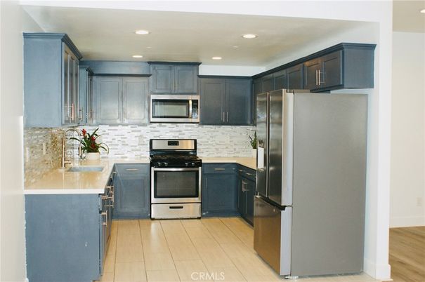 Interior, Kitchen, Recessed Lighting, Stainless Steel Appliances, Wood Texture Flooring