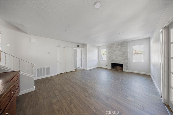 Empty room, Fireplace, Interior, Stone Walls, Wood Texture Flooring