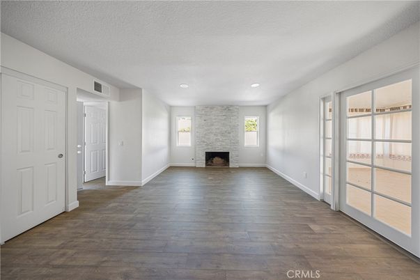 Empty room, Fireplace, Interior, Recessed Lighting, Wood Texture Flooring
