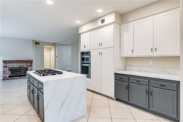Fireplace, Interior, Kitchen, Recessed Lighting, Stainless Steel Appliances