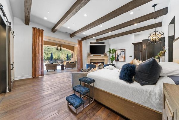 Bedroom, Fireplace, Interior, Living room, Pendant Lights, Recessed Lighting, Wooden Beams, Wood Texture Flooring